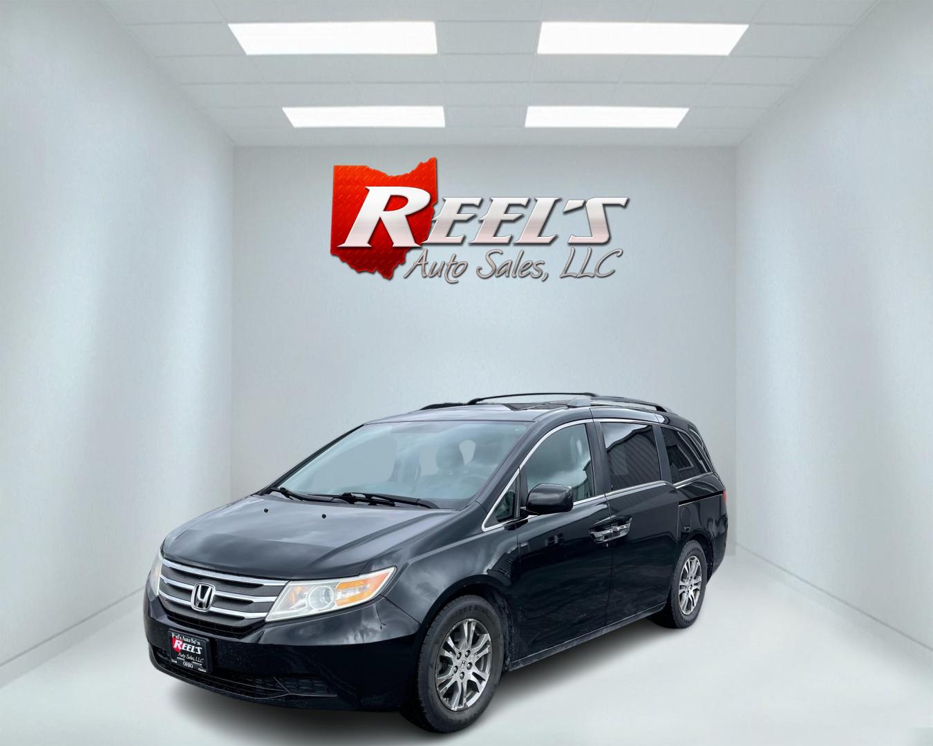 2013 Black /Gray Honda Odyssey EX-L W/ RES (5FNRL5H64DB) with an 3.5L V6 SOHC 24V engine, 5-Speed Automatic transmission, located at 11115 Chardon Rd. , Chardon, OH, 44024, (440) 214-9705, 41.580246, -81.241943 - Photo#0